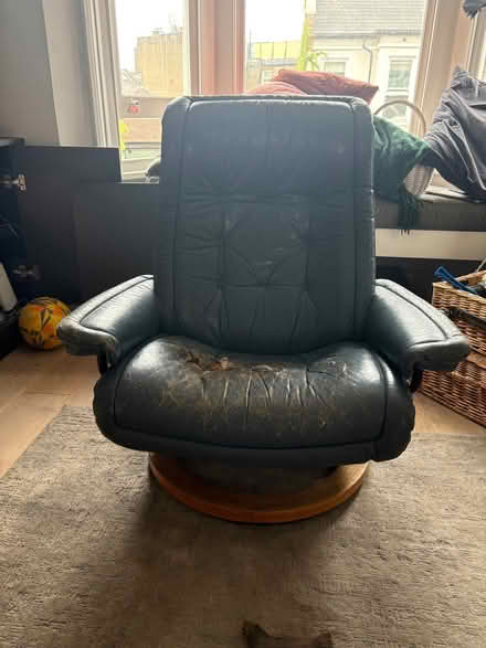 Photo of free Leather armchair wooden base (Fulham Palace Rd SW6) #1