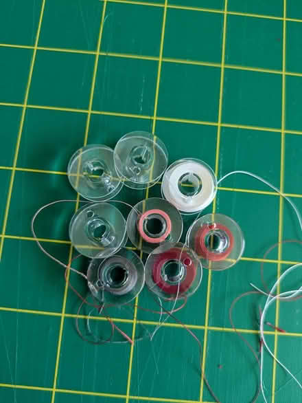 Photo of free 8 singer brand bobbins (F section of Bowie) #1