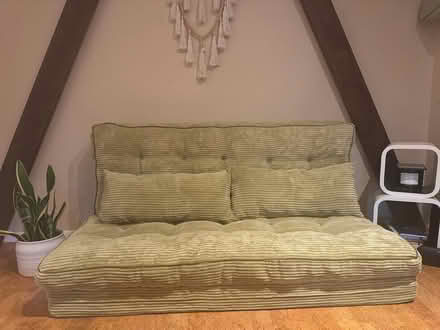 Photo of free Green Futon Couch (4912 S 28th Street, Arlington) #3