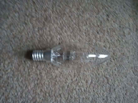 Photo of free Small screw fitting candle shaped light bulb (Stroud GL5) #1