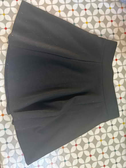 Photo of free Black elastic school skirt 4-5 (Wheatley, OX33) #1