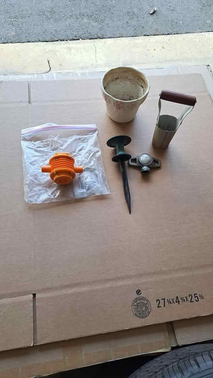 Photo of free Sprinkler, fluid pump, hose stake (Off of Rt 206 and Triangle Rd) #1