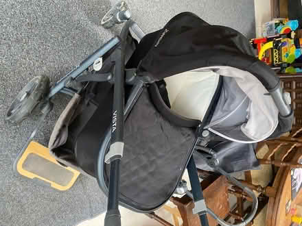 Photo of free Black pushchair/ carrycot and buggy board (Guilsfield SY21) #1