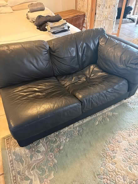 Photo of free Leather small couch (Tugun) #1