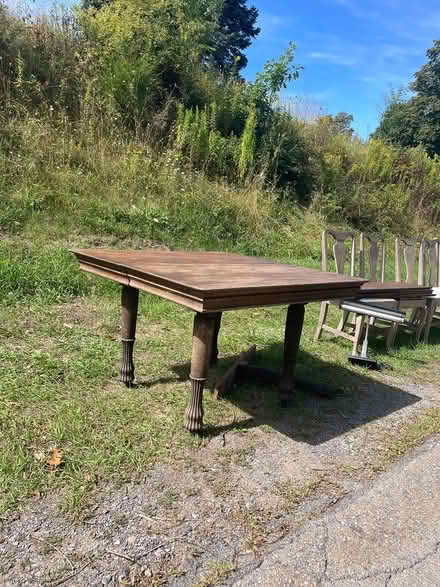 Photo of free Wood Table and Chairs (8329 South Shore Road, Sodus P) #4