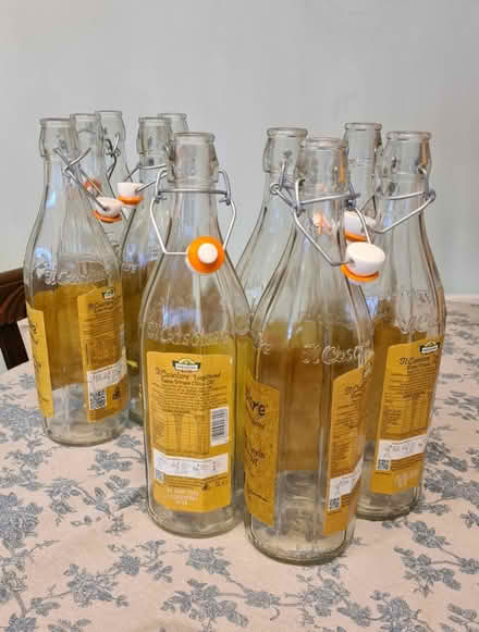 Photo of free 1lt glass bottles w/stopper, CLEAN (Lambeg BT27 4) #1