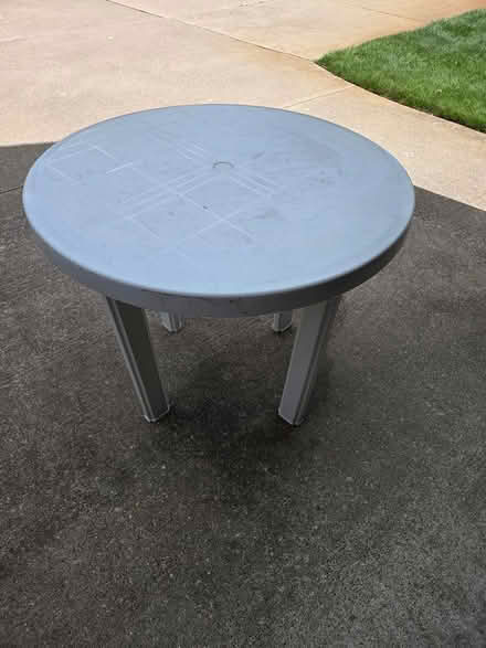Photo of free Plastic patio table (Howell) #1