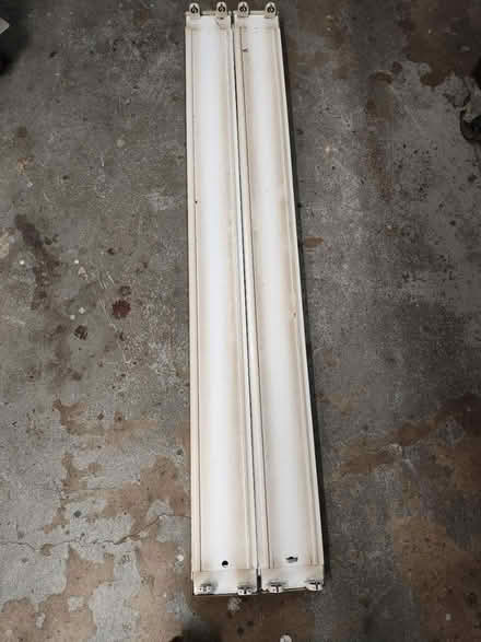 Photo of free 2 4 foot T8 shop light fixtures (Westmont) #1