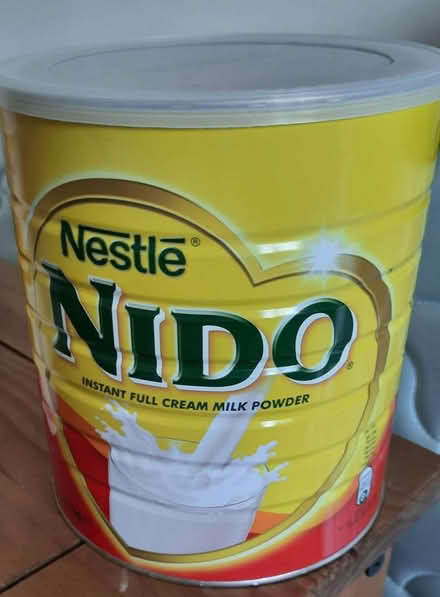 Photo of free Empty large Nido Tins with Lids (Temple Cowley OX4) #1