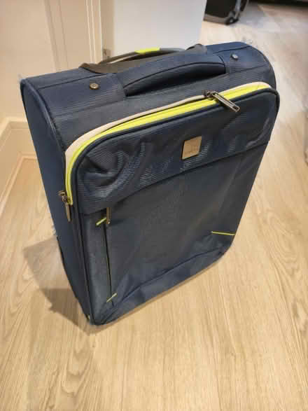 Photo of free Blue small luggage (green accents) (SG63AW) #1