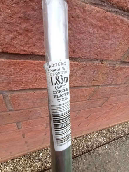 Photo of free New 6 foot chrome poles (Melksham) #3