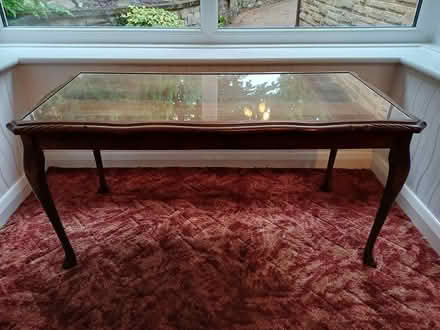 Photo of free Wooden table with glass top (Holloway DE4) #1