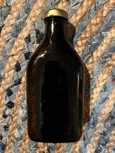 Photo of free Empty 500ml glass brown large bottle. (West Hill TN34) #1