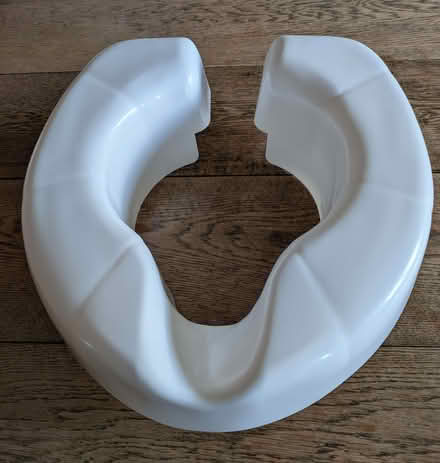 Photo of free Clip-on raised toilet seat, unused (Finstall B60) #1