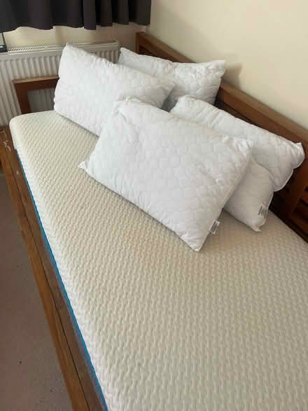 Photo of free 4 Pillows and a standard Mullard mattress (Teddington TW11) #1