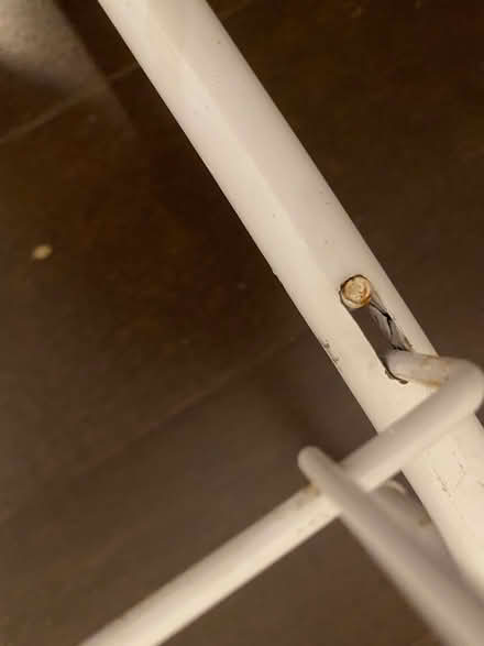 Photo of free White metal shoe rack (NE DC) #2