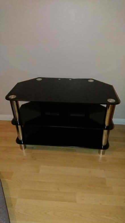 Photo of free Black glass tv unit (Upwell) #1