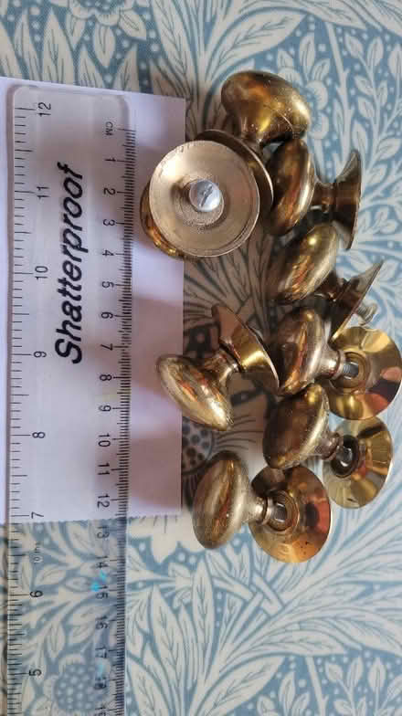 Photo of free 8 brass door/cupboard knobs (Palmer Park RG6) #1