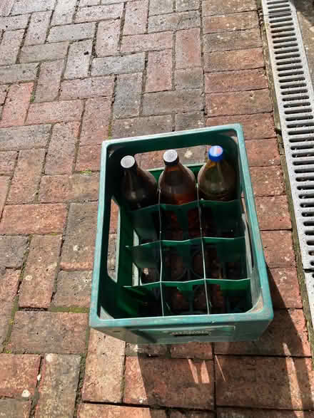 Photo of free Crate with several large home brew bottles (Gosport PO12) #1