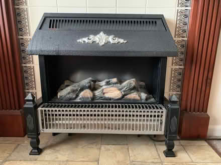 Photo of free Electric log effect fire and heater (Hertford SG14) #1