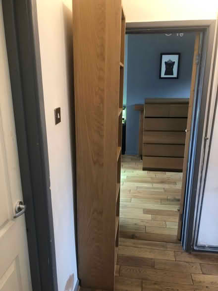 Photo of free Tall wood shelves (M30 8HP) #1