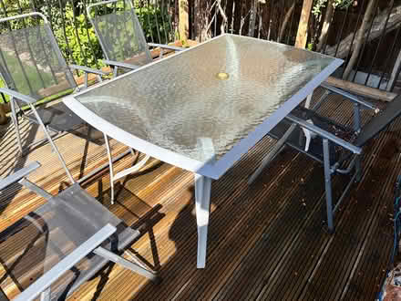 Photo of free Glass table and 4 folding chairs (Swanley) #1