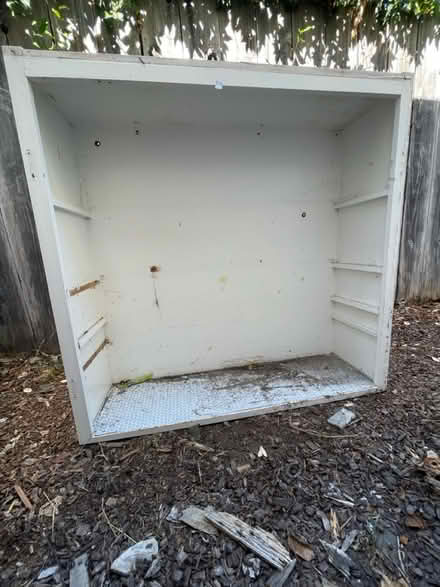 Photo of free Large wood white upper cabinet (Lower west side) #1