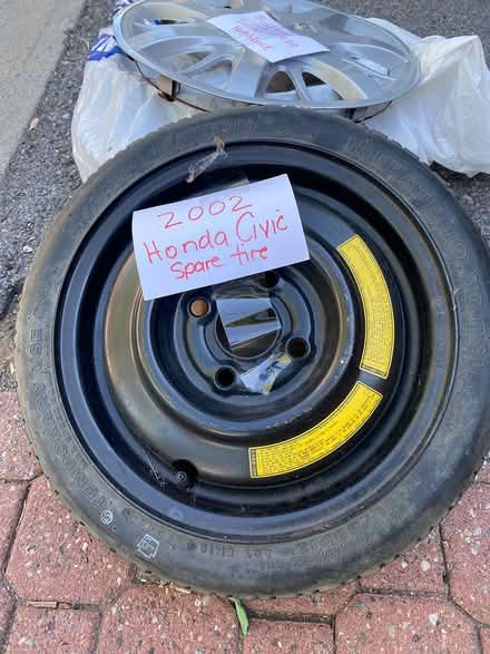 Photo of free 2002 spare tire; 2010 hub caps (Sandy Hill Templeton & Russell) #2
