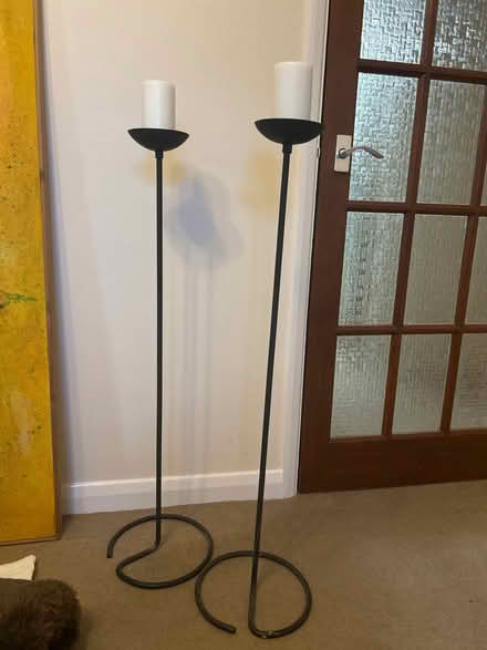 Photo of free 2 Black metal candlesticks with candles (South Oxfordshire OX9) #1