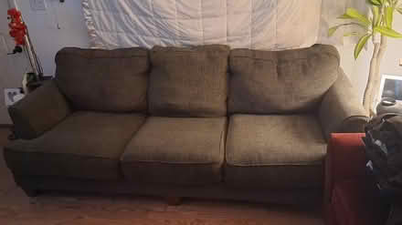 Photo of free Couch (Off of Alamo. North side) #1