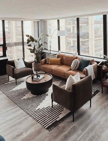 Photo of free 6’7” x 9’ living room rug (Gold Coast) #1