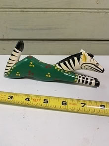 Photo of free Wooden zebra toy (Nr Fresh Pond & Mt Auburn Cem.) #1