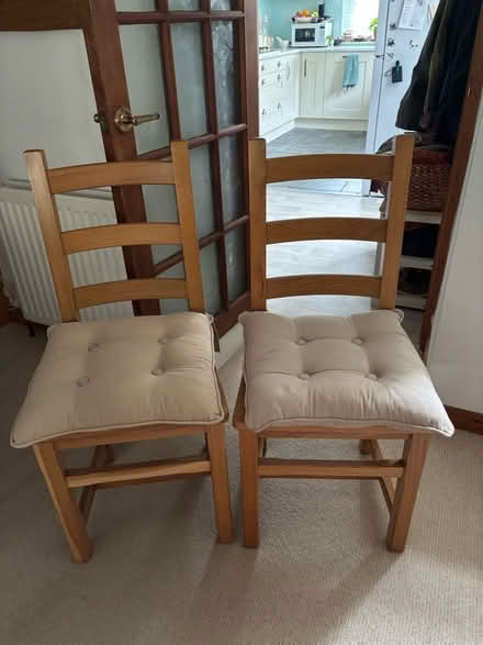 Photo of free Two solid oak kitchen chairs (Hayle TR27) #1