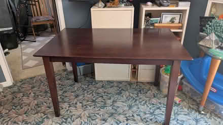 Photo of free Rectangle dining table (13 and crooks) #2