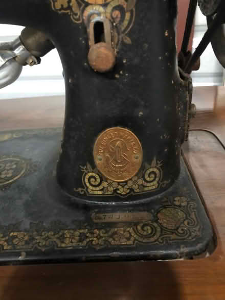 Photo of free Antique Singer sewing machine/table (Frederick, MD) #4