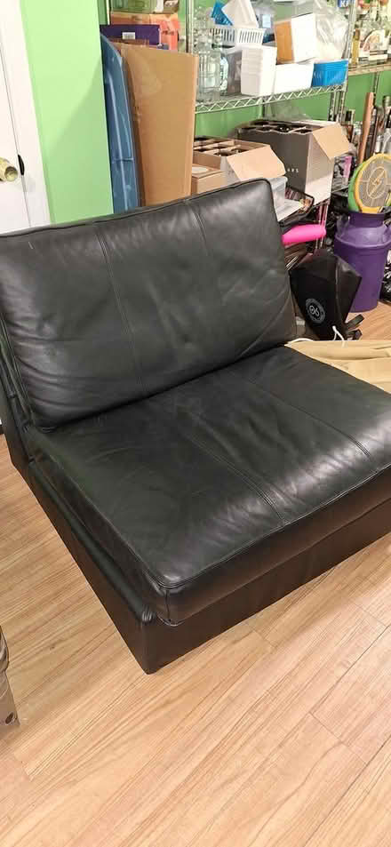 Photo of free Leather chair with ottoman on curb (Framingham, Massachusetts) #1