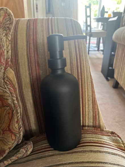 Photo of free Black glass bottles with pump dispenser (Loansdean NE61) #1