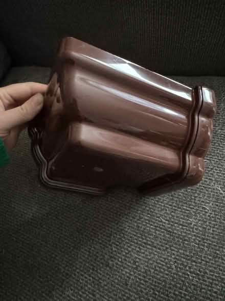 Photo of free Brown Ogee corner gutter piece (Darnley G53) #1