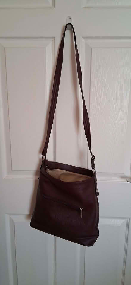 Photo of free red cross the body bag (Wigmore LU2) #1