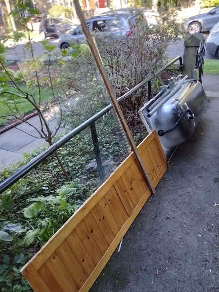 Photo of free Steel bath, wooden panelled bath panel, glass over bath show (Birkby HD2) #2
