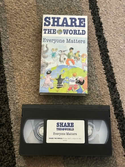 Photo of free Share the world vhs tape & poster (Jennetts park RG12) #3