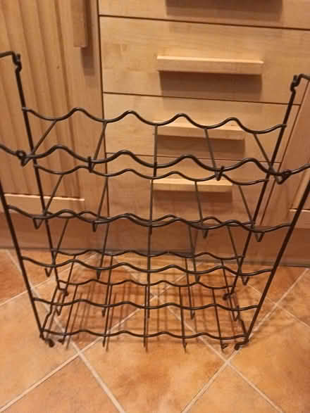 Photo of free Metal bottle rack (Kingsley Park) #1