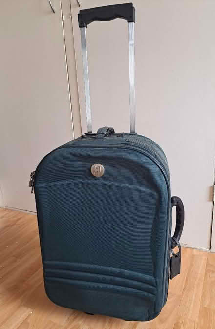 Photo of free Rather battered small wheeled suitcase (Seaside BN22) #1