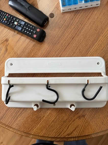 Photo of free Rubbermaid broom mop holder (Bensenville) #1