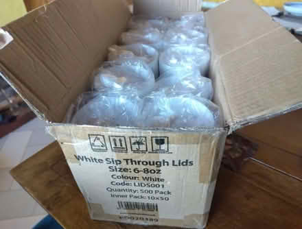 Photo of free Box of paper cup lids (East Ardsley WF3) #1