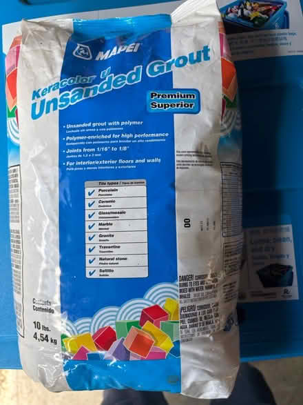 Photo of free Unopened bag of white sanded grout (Miraloma Park) #1