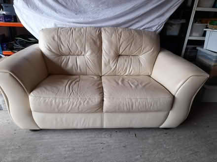 Photo of free Cream leather sofa and footstool (Worcester) #1