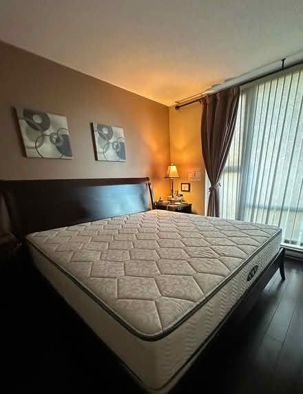 Photo of free Wooden king bed and mattress (V6z) #1