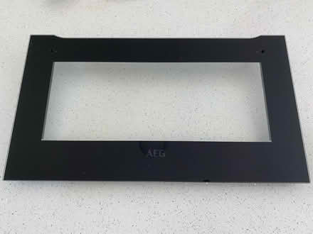 Photo of free AEG Inox m/w door glass assembly (Ropley SO24) #1