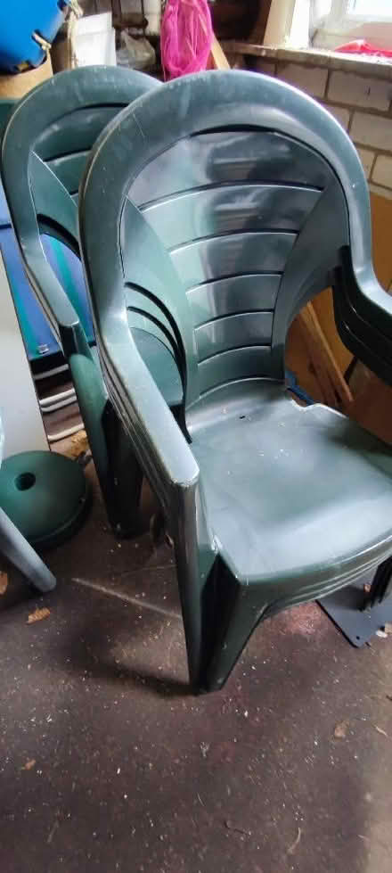 Photo of free 6 green plastic garden chairs (The Folly BN7) #1